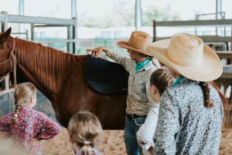 Learn how to saddle a horse as part of the School Holiday Program at Katherine Outback
Experience (Credit: Stephanie Coombes Creative)